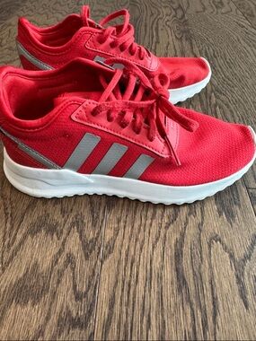 Red Adidas Sneakers with Silver Stripes